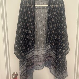 Blue, white and a little pink Patterned Kimono.  One size fits most.